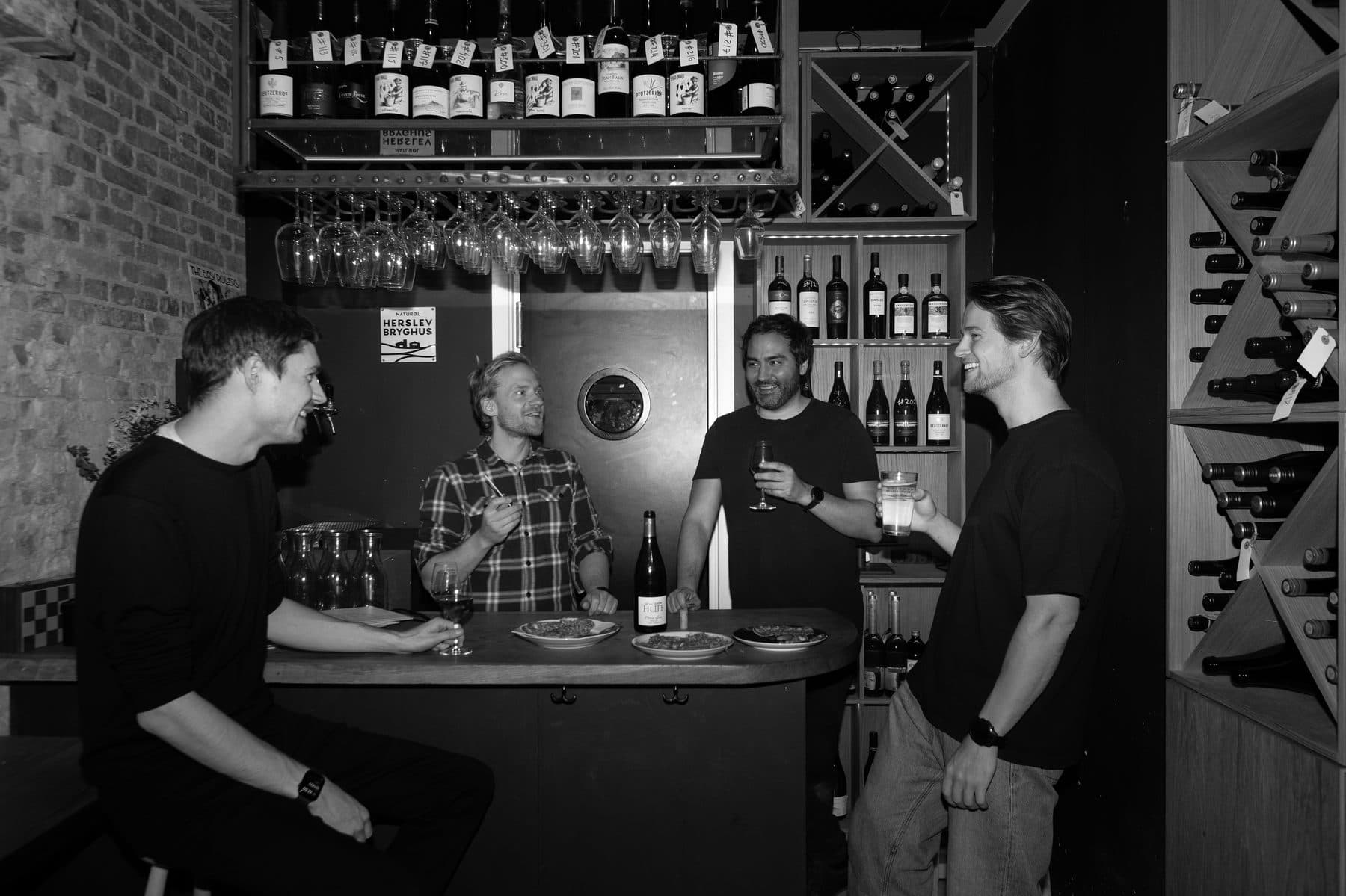 The owners behind Vesterhus together in the bar